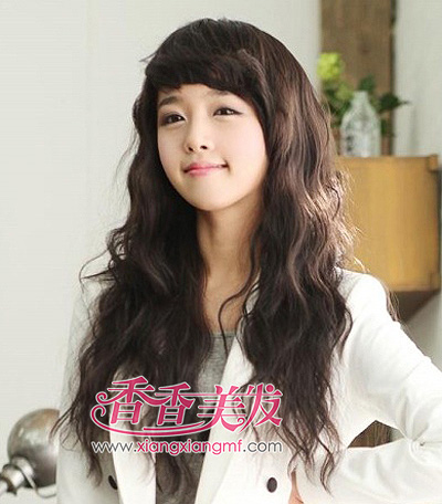 最新2015长发烫发蛋卷头发型图片 长发蛋卷头