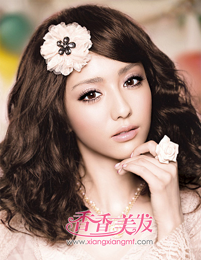 最新2015长发烫发蛋卷头发型图片 长发蛋卷头