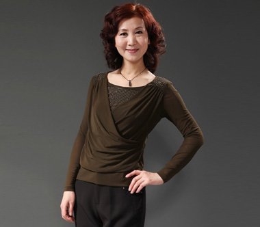 松弛脸型的50岁女人发型 发型脸型设计50岁