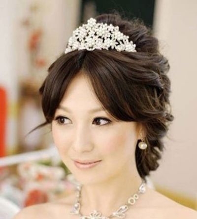 四十岁大脸盘适合的卷发 中年女盘发图片