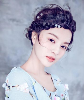 ���˵�ͷ����ô������ Ů�����������ӵ��̷�����