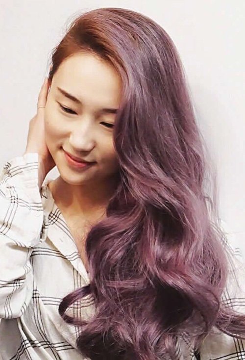 如何打理迷人卷烫头发造型 切换潮女风采的女生卷发